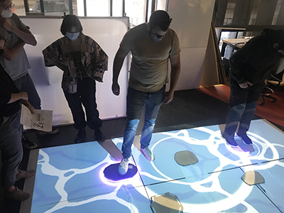 People interacting with the prototype